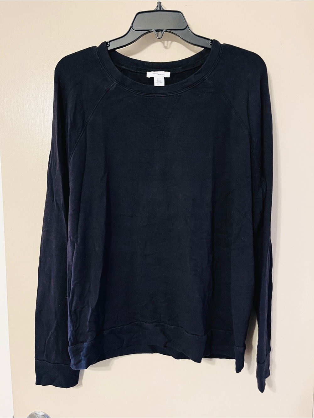 Black crewneck sweatshirt